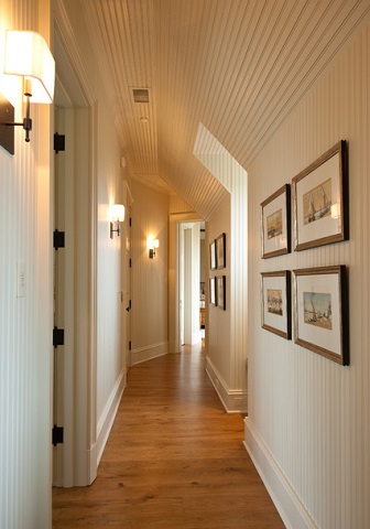 To maximize the light gained from a sconce, look for models that cast light both up and down (by Solaris Inc)