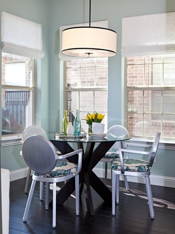 Metal chairs can work surprisingly well in a transitional dining room, particularly if you choose ones with a more traditional silhouette (by Abbe Fenimore Studio Ten 25)
