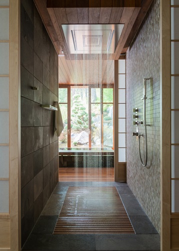 The real advantage of custom showers is that you have total control of the placement, type, and flow of all your shower heads, allowing you to get a truly full-body shower experience (by CTA Architects Engineers)