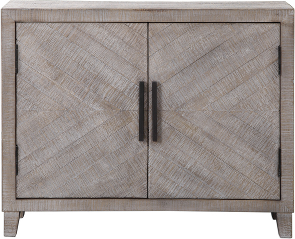 Uttermost  Accent Cabinets Chests and Cabinets This Modern Farmhouse Two Door Cabinet Features Linear Textured Fir Wood, Finished In A White Washed Glaze With Oatmeal Undertones. Antique Bronze Iron Door Pulls Open To One Adjustable Shelf.